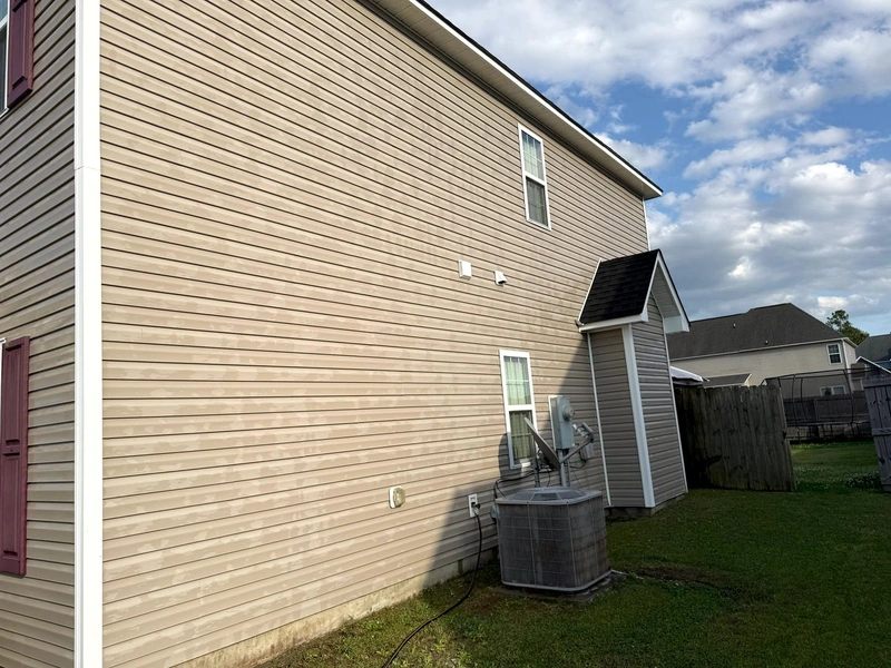 Professional pressure washing service cleaning a home in Sneads Ferry NC