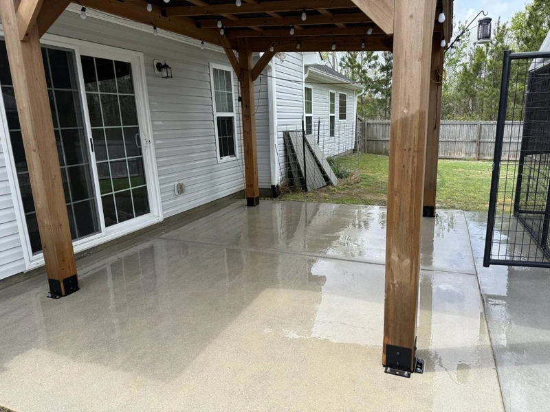 Professional deck and patio cleaning service restoring outdoor surfaces