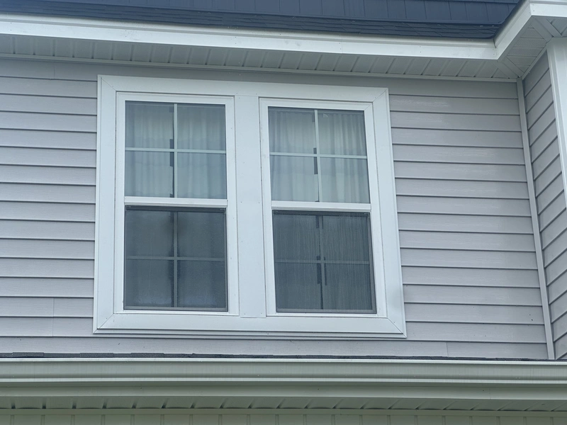 Clean, streak-free windows on a Jacksonville NC home after professional window cleaning