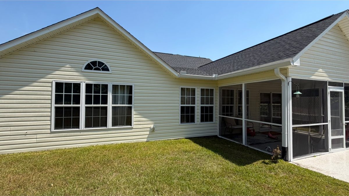 Single-storey home and screened porch after cleaning