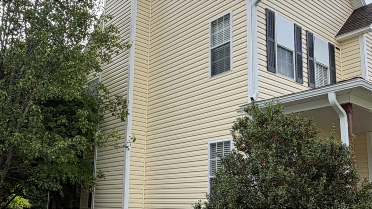Two-storey siding elevation after cleaning