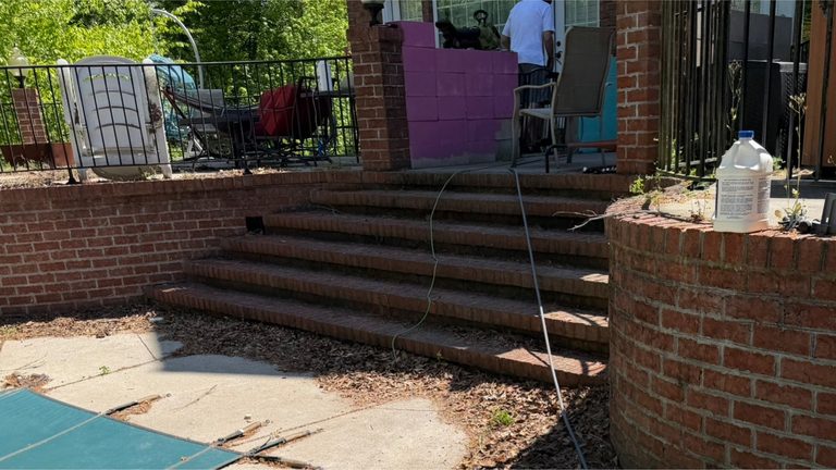 Brick steps and landing before cleaning