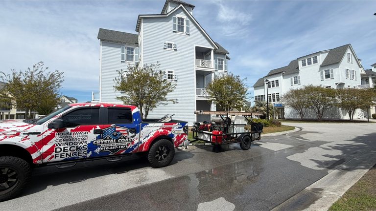 The same apartment community building and drive after cleaning