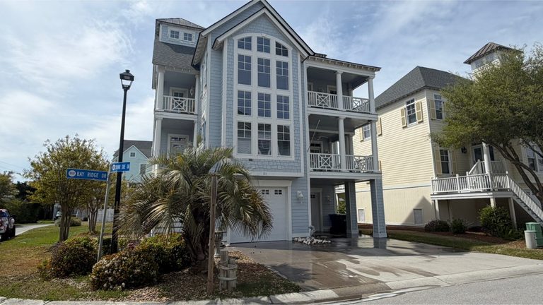 Apartment community building and drive before exterior cleaning
